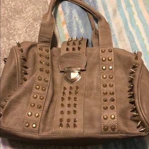 Tan gold studded purse from buckle